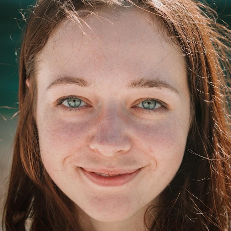 Kaveri Mehta, Lead Design Curator at Garden River Arch, reviewing corporate floral arrangements